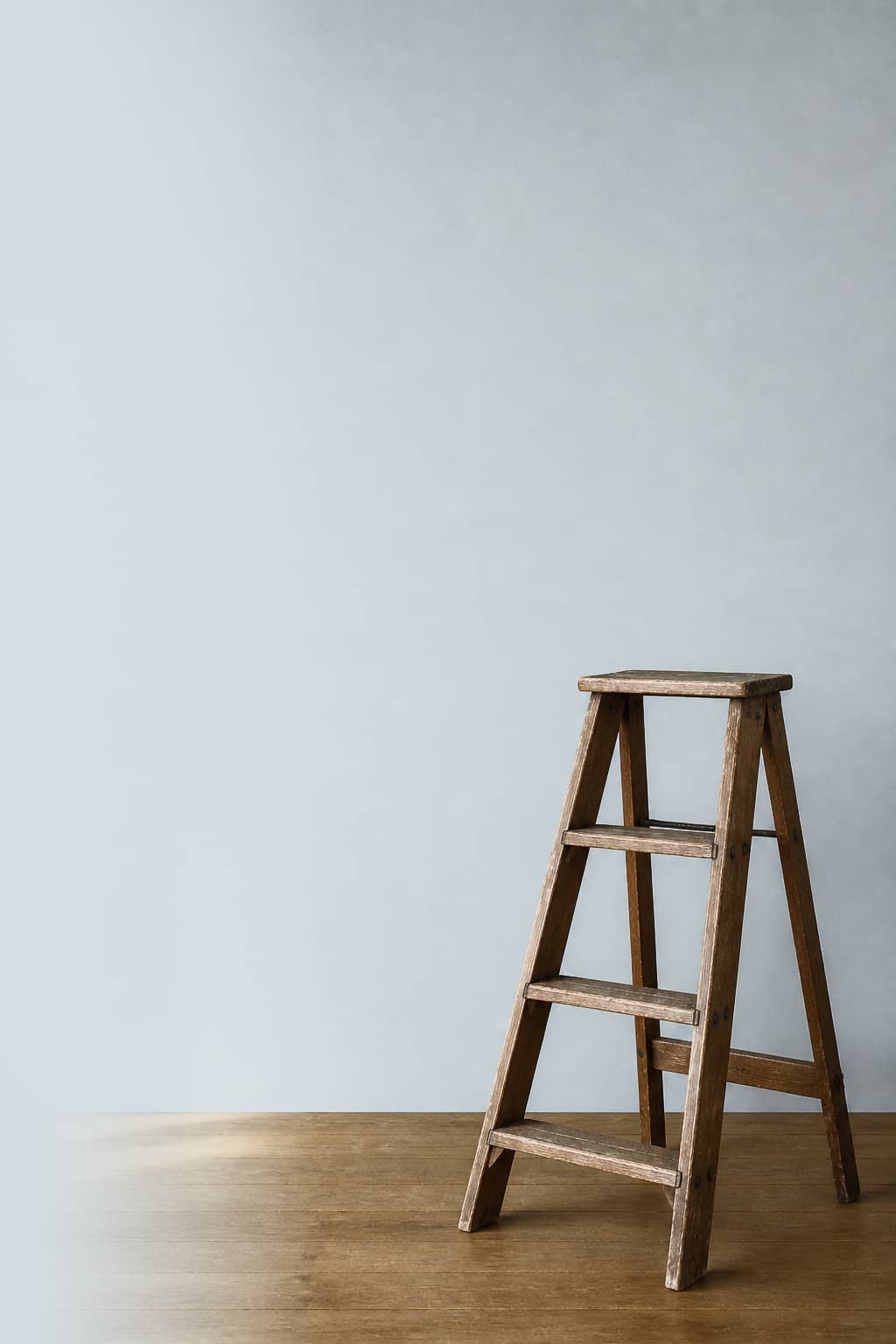 Stepladder against a slate painted wall